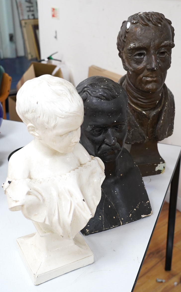 Three decorative plaster busts; the Duke of Wellington, 60cm high, another male figure, and a child. Condition - poor